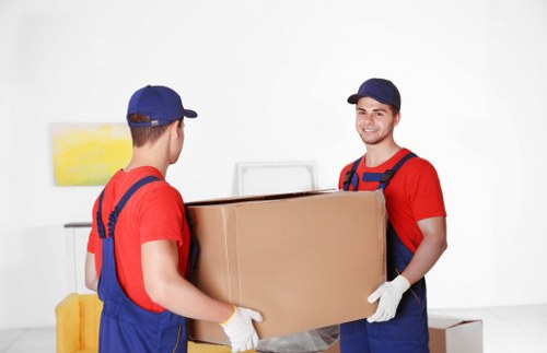 Removal team handling a residential move in New Cross