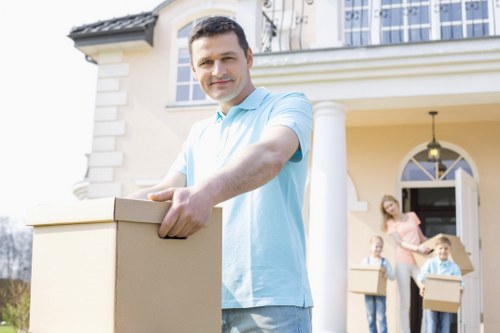 Local movers handling apartment access in New Cross