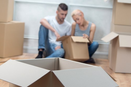 Removal team confirming a booking and service details