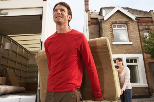 Furniture being transported during a home move in New Cross