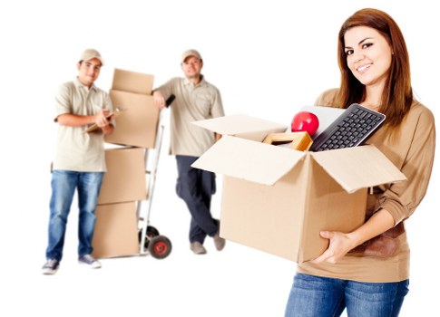Loading bulky household furniture in a New Cross property
