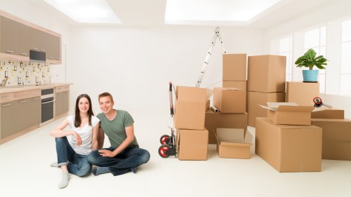 Unpacking and organising boxes in a New Cross property