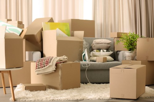 Removal team loading household items for a New Cross move