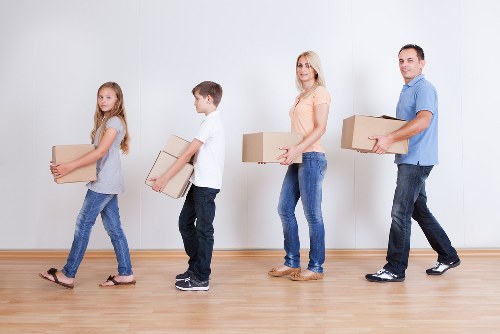 Local packing team preparing items for transport in New Cross