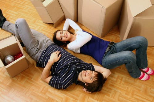 Local removal truck hire helping with furniture loading in New Cross